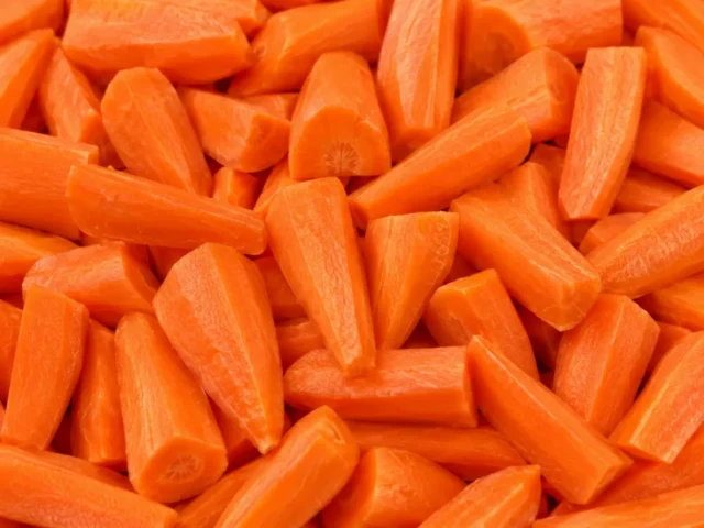 Freshly prepared quarter cut carrots