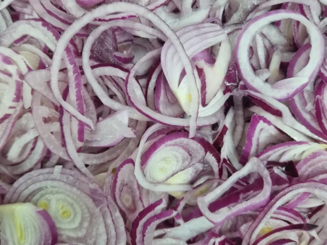 Freshly prepared sliced red onions